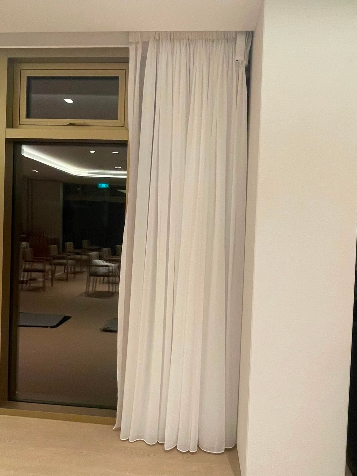 Sheer curtain, corner window